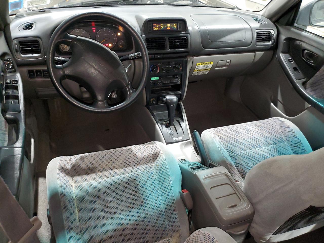 1999 Subaru Forester S VIN: JF1SF6559XH744986 Lot: 63837855