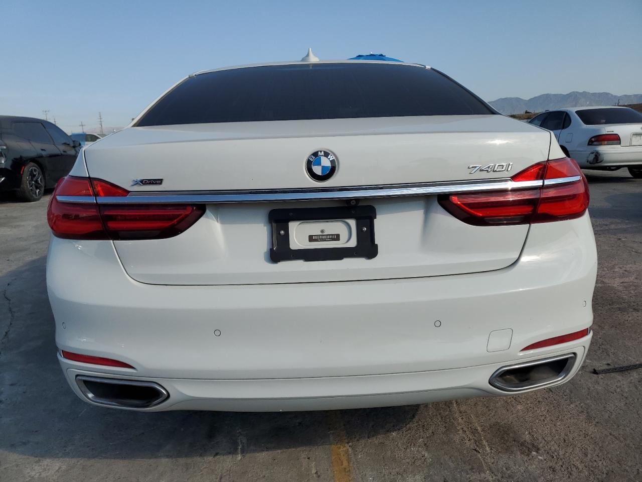 2017 BMW 740 Xi VIN: WBA7E4C59HGU99458 Lot: 65413575