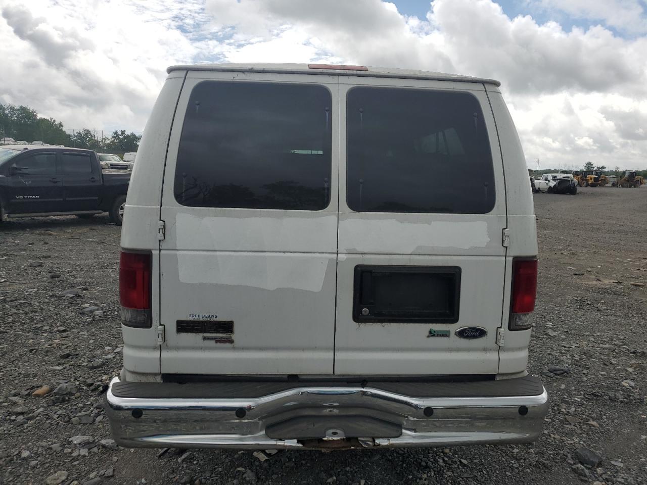 2010 Ford Econoline E350 Super Duty Wagon VIN: 1FBSS3BL0ADA23899 Lot: 62390955