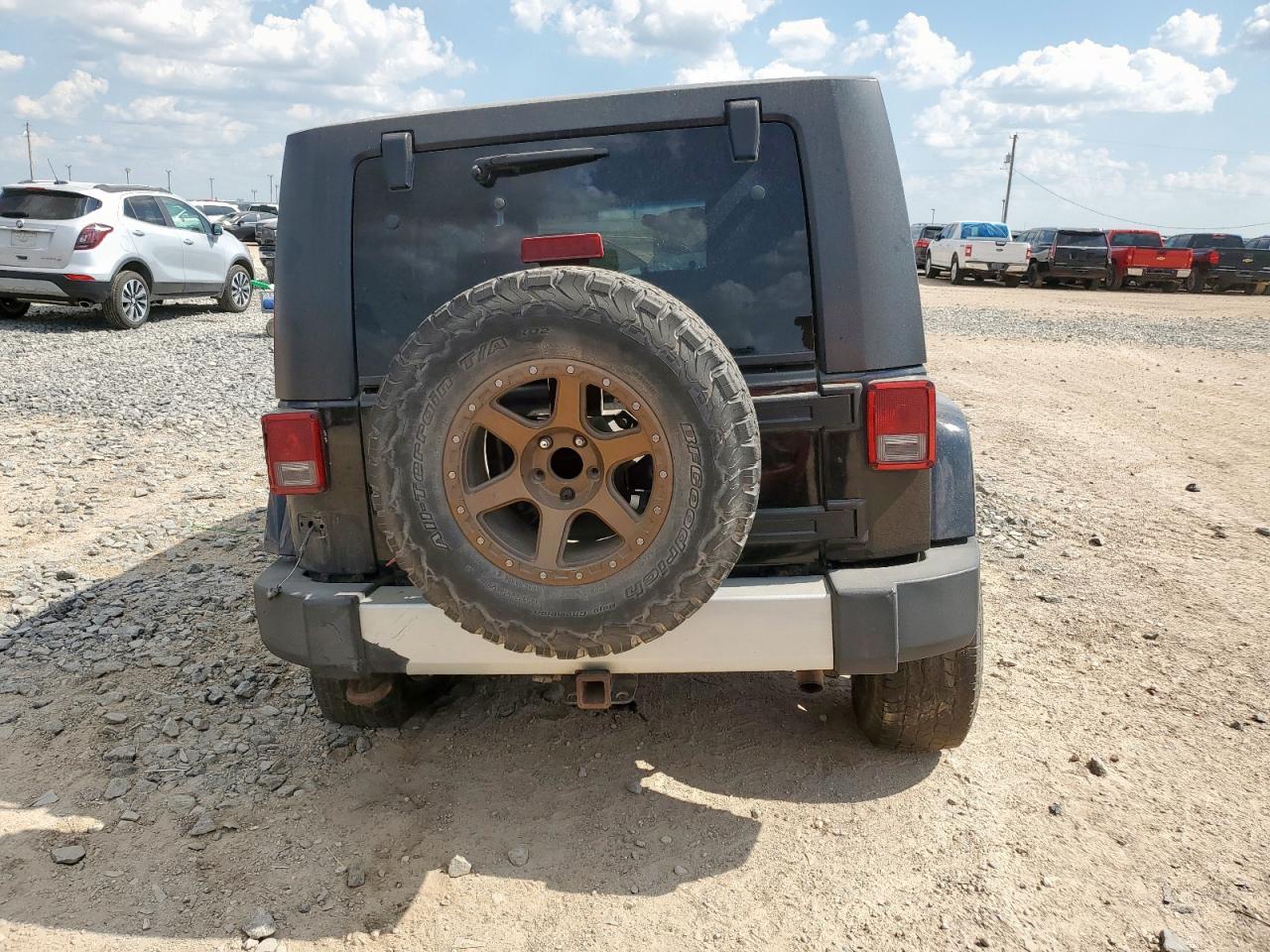 2009 Jeep Wrangler Unlimited Sahara VIN: 1J4GA59119L787129 Lot: 64884105