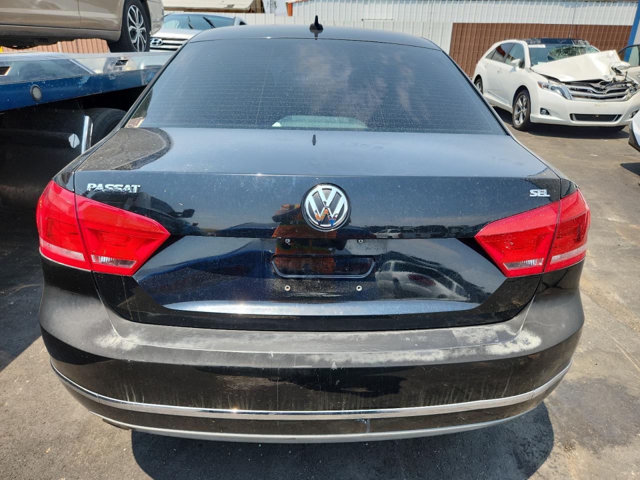 2013 Volkswagen Passat Sel VIN: 1VWCH7A33DC019795 Lot: 64848525