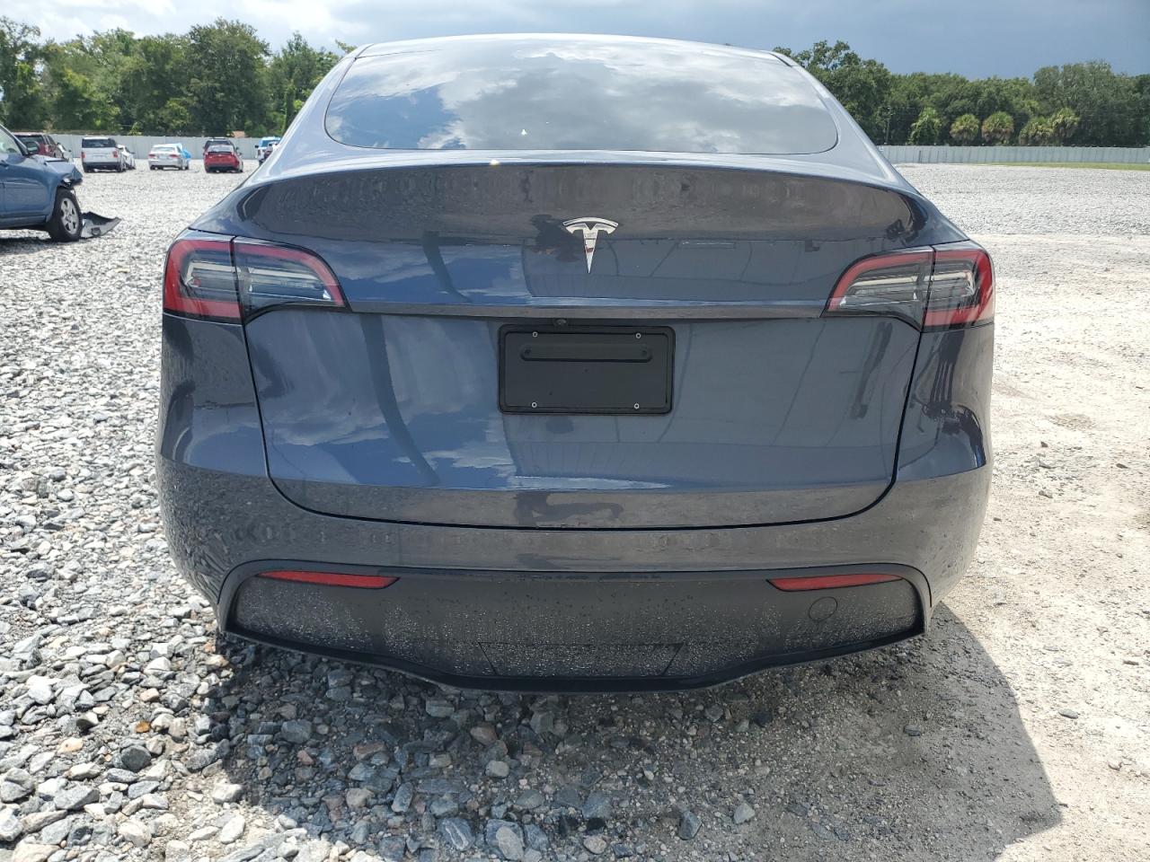 2023 Tesla Model Y VIN: 7SAYGDED1PF958354 Lot: 64396985