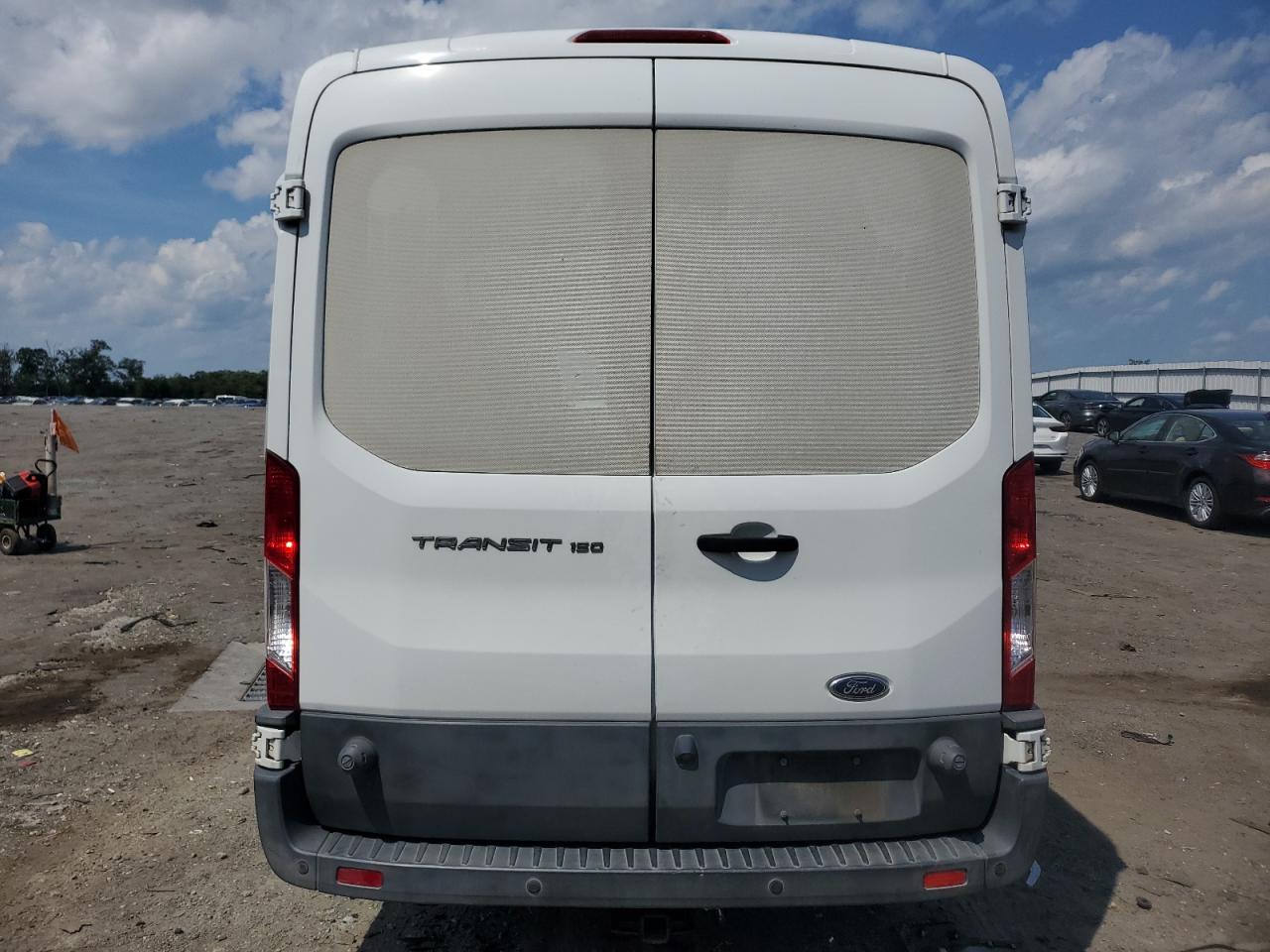 2016 Ford Transit T-150 VIN: 1FTYE2CM0GKB53555 Lot: 64056995