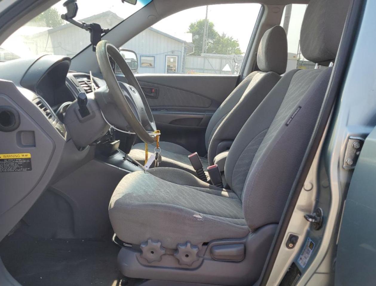 2005 Hyundai Tucson Gl VIN: KM8JM12B75U180957 Lot: 62412015