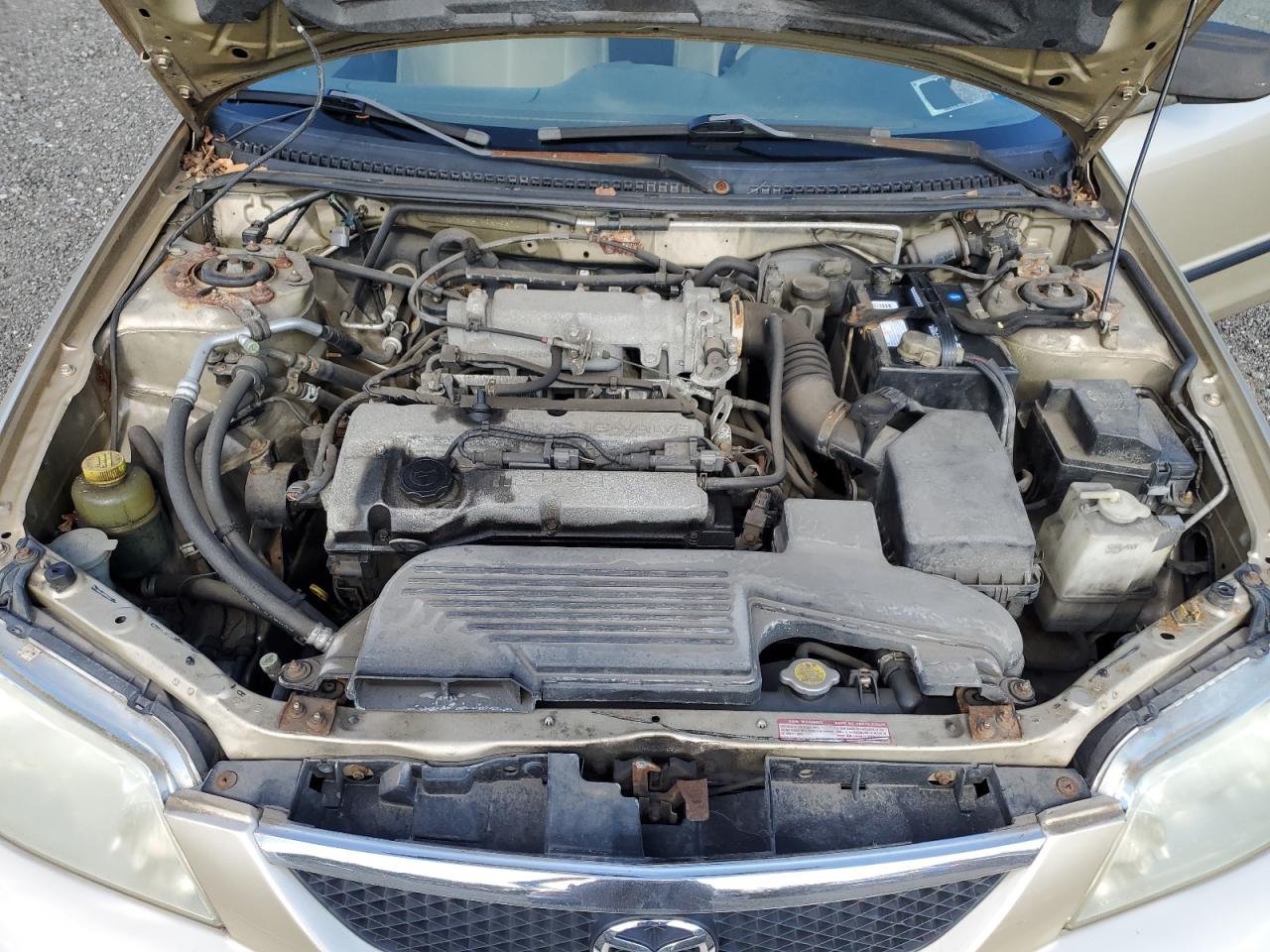 2001 Mazda Protege Dx VIN: JM1BJ222710440671 Lot: 65161515