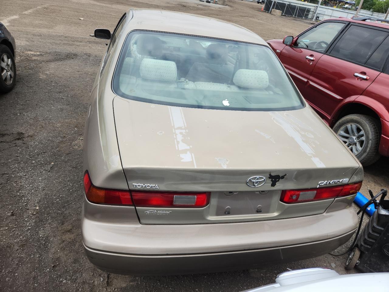 1999 Toyota Camry Le VIN: JT2BG22K4X0278689 Lot: 64374575