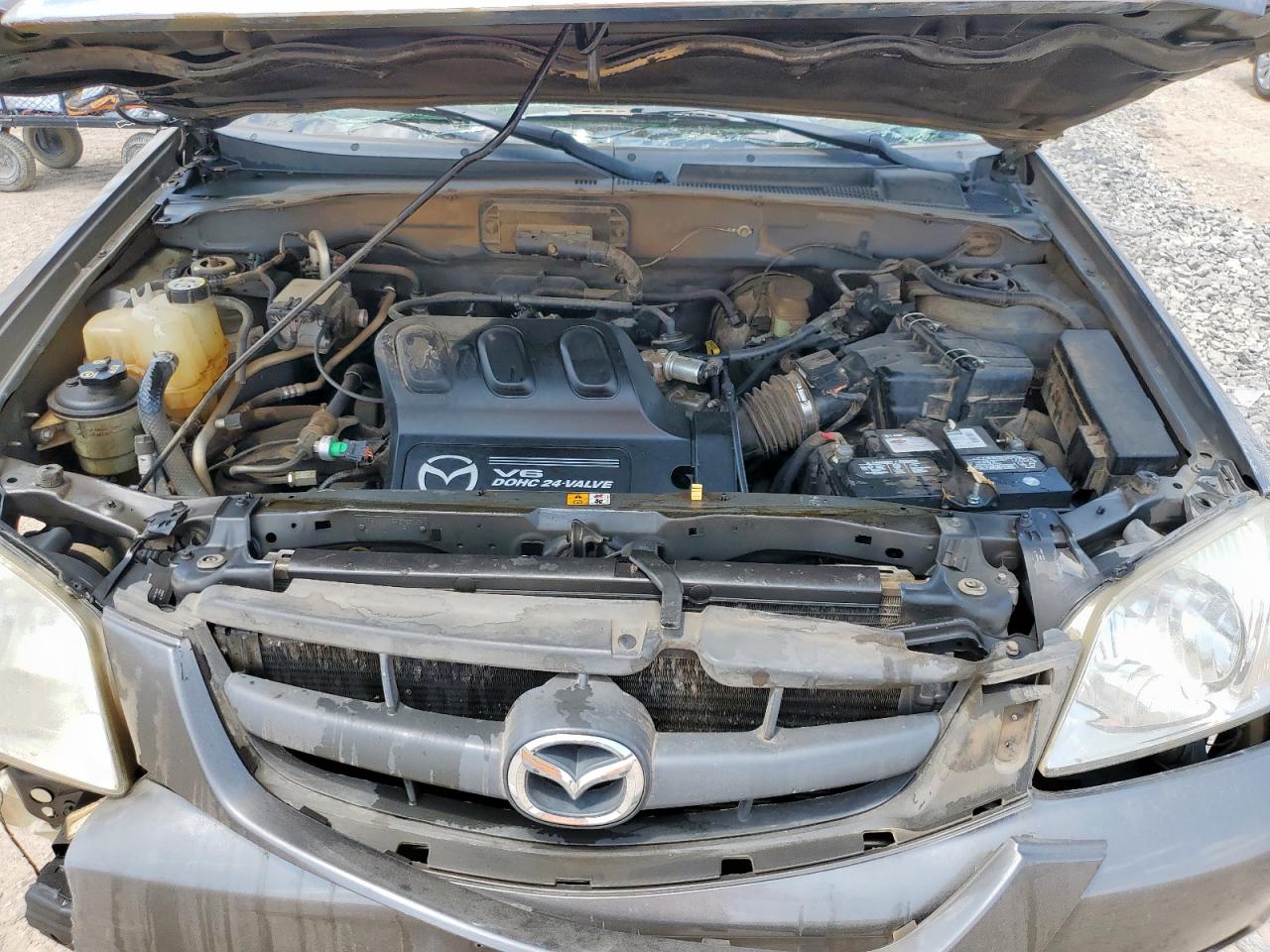 2004 Mazda Tribute Lx VIN: 4F2YZ04184KM02371 Lot: 64953645