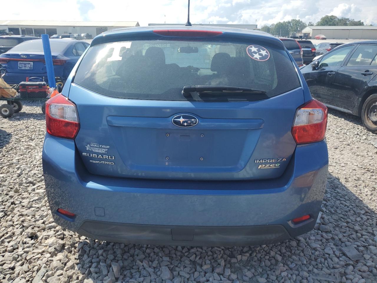 2014 Subaru Impreza VIN: JF1GPAA69E8290921 Lot: 62877355