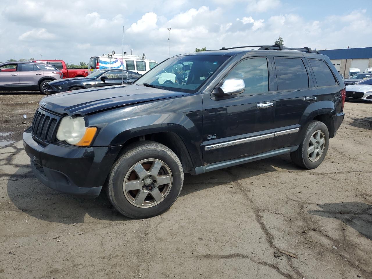 2009 Jeep Grand Cherokee Laredo black null gas 1J8GR48KX9C555446 photo #1
