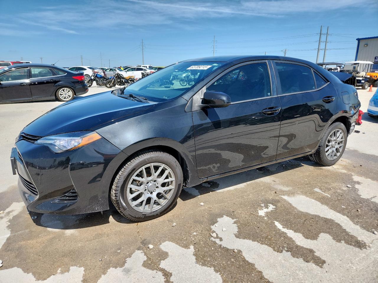 2017 Toyota Corolla L black null gas 5YFBURHEXHP602312 photo #1