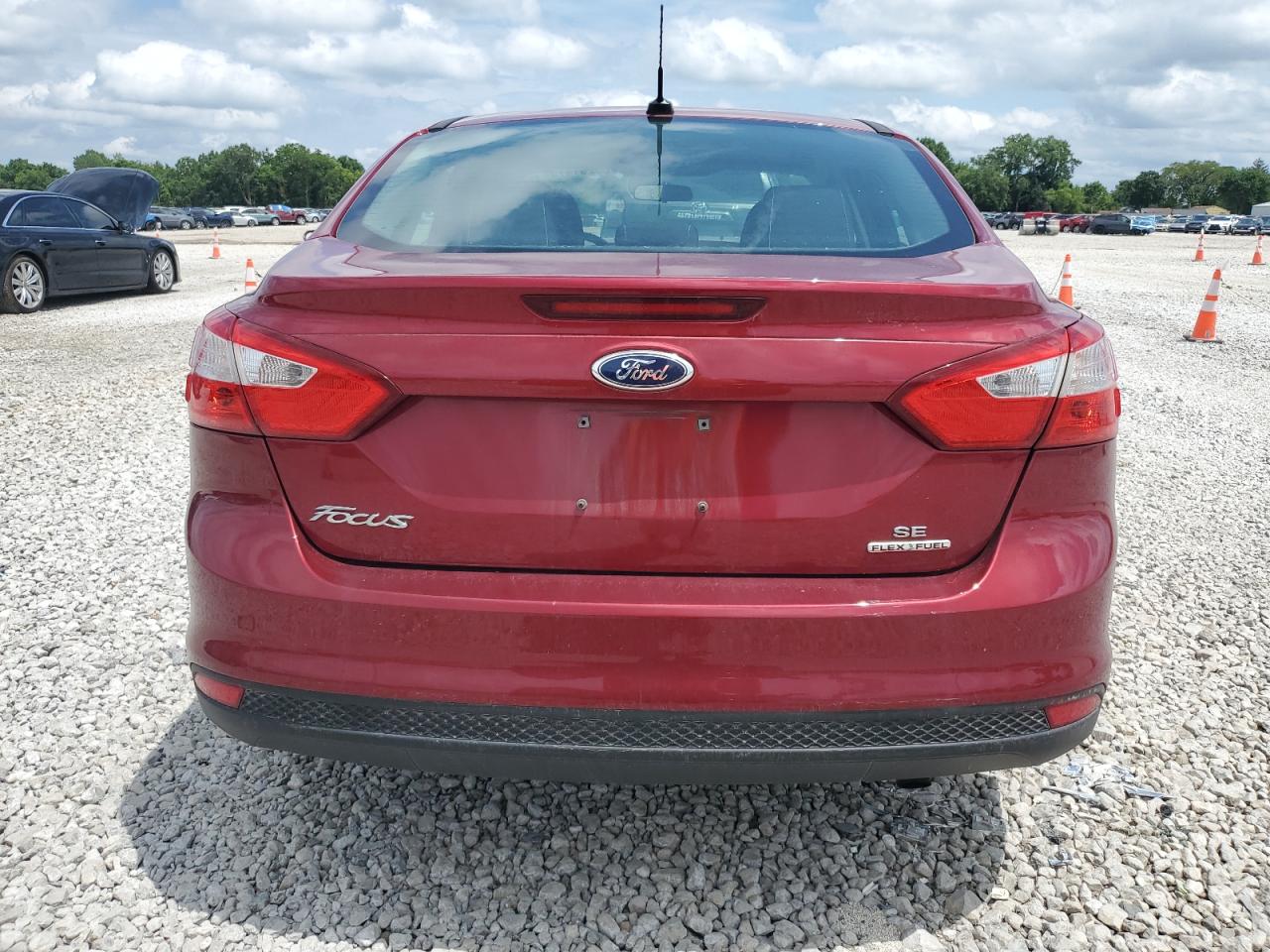 2014 Ford Focus Se VIN: 1FADP3F24EL310302 Lot: 65281475