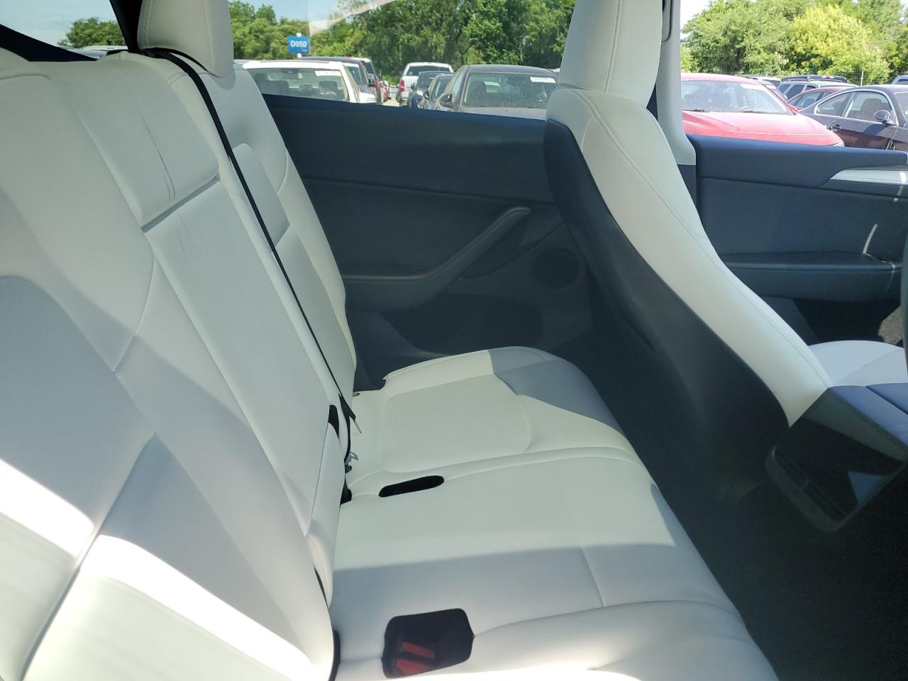 2023 Tesla Model Y VIN: 7SAYGAEE3PF710131 Lot: 64367905