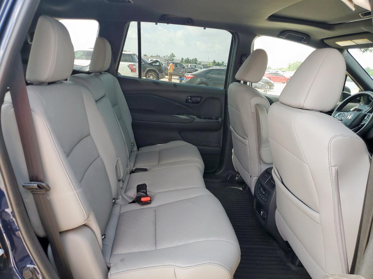 2023 Honda Passport Elite VIN: 5FNYF8H04PB026424 Lot: 65095545