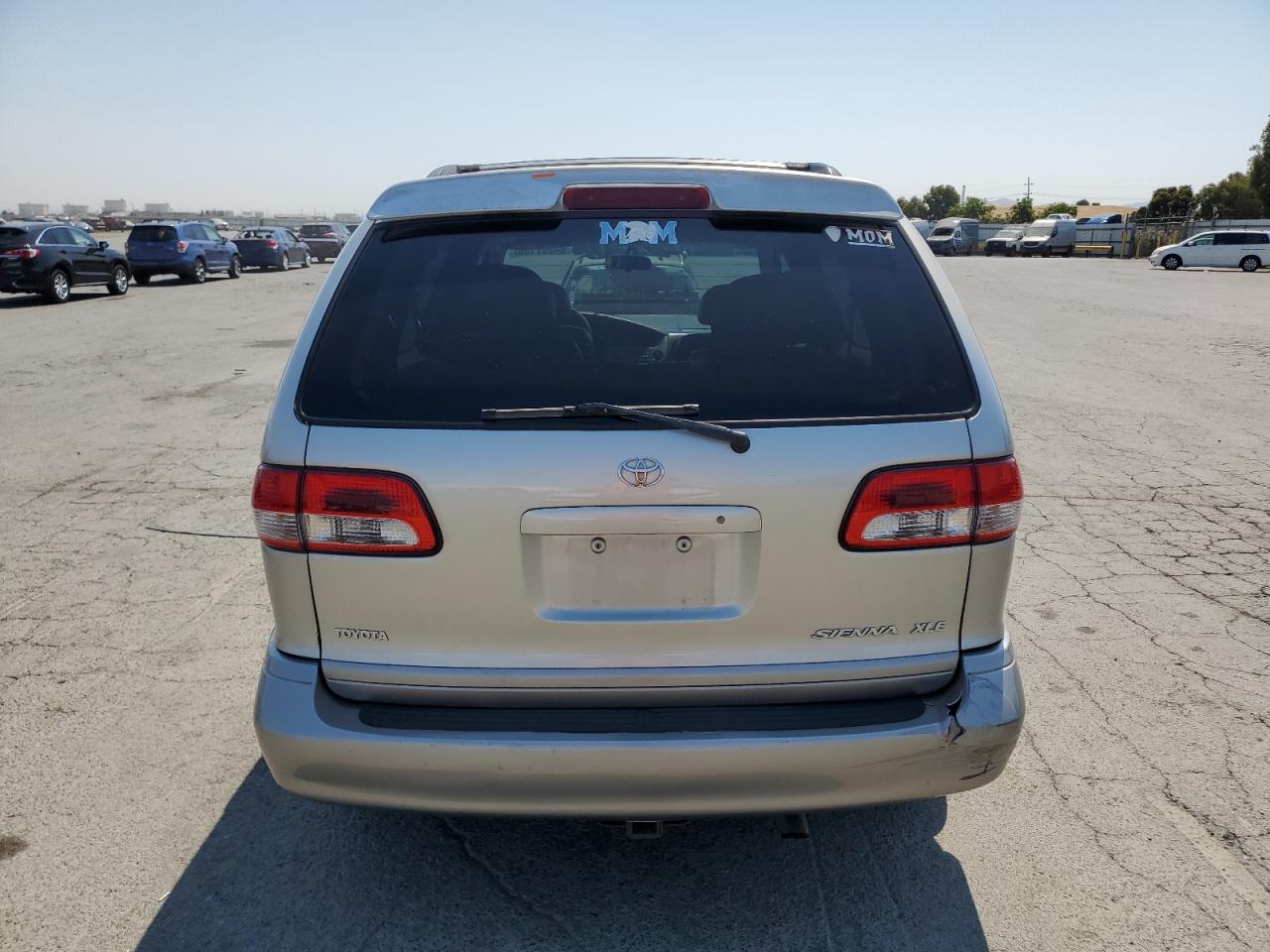 2001 Toyota Sienna Le VIN: 4T3ZF13CX1U357345 Lot: 64207105