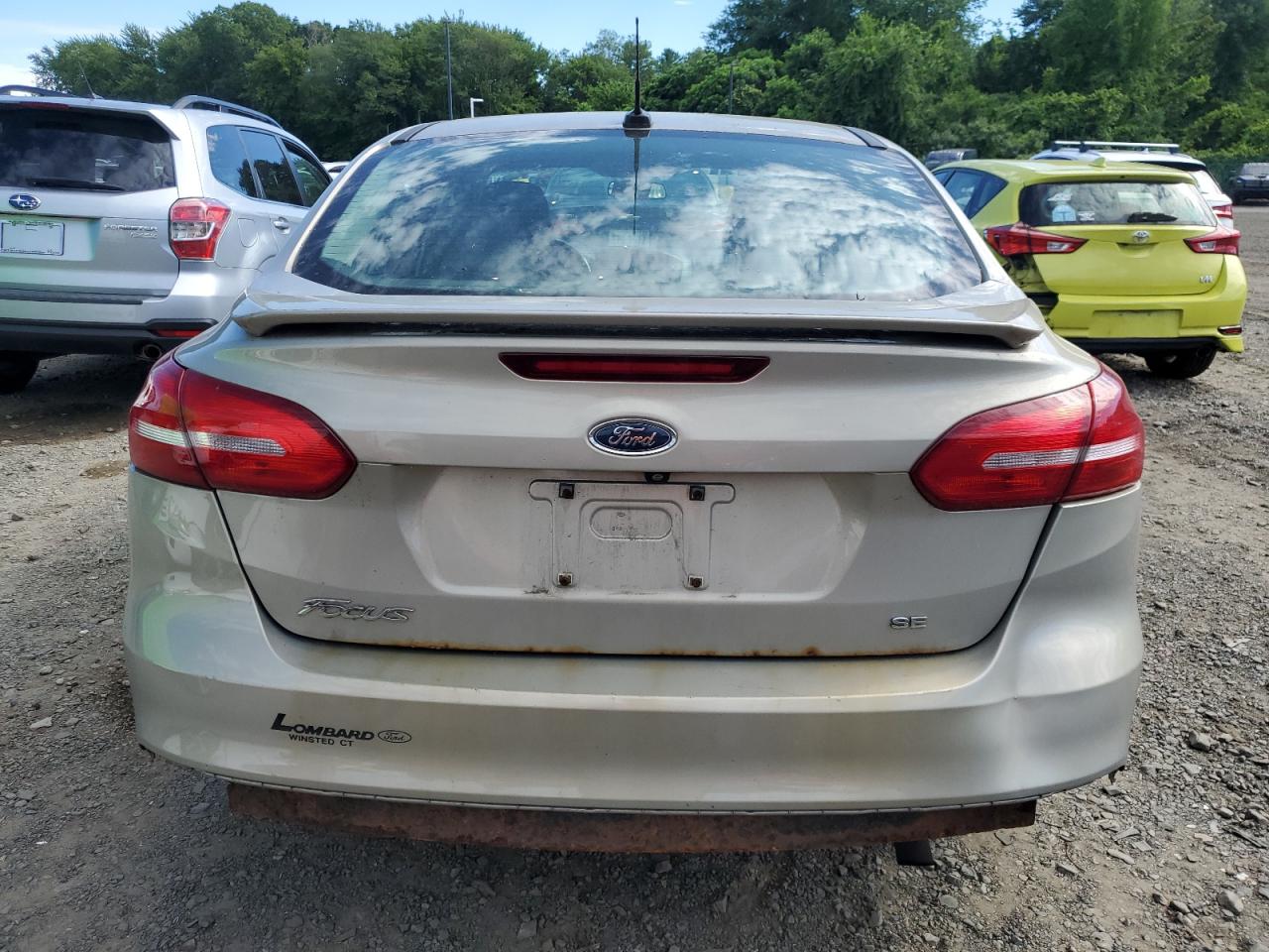 2015 Ford Focus Se VIN: 1FADP3F22FL283411 Lot: 65126655