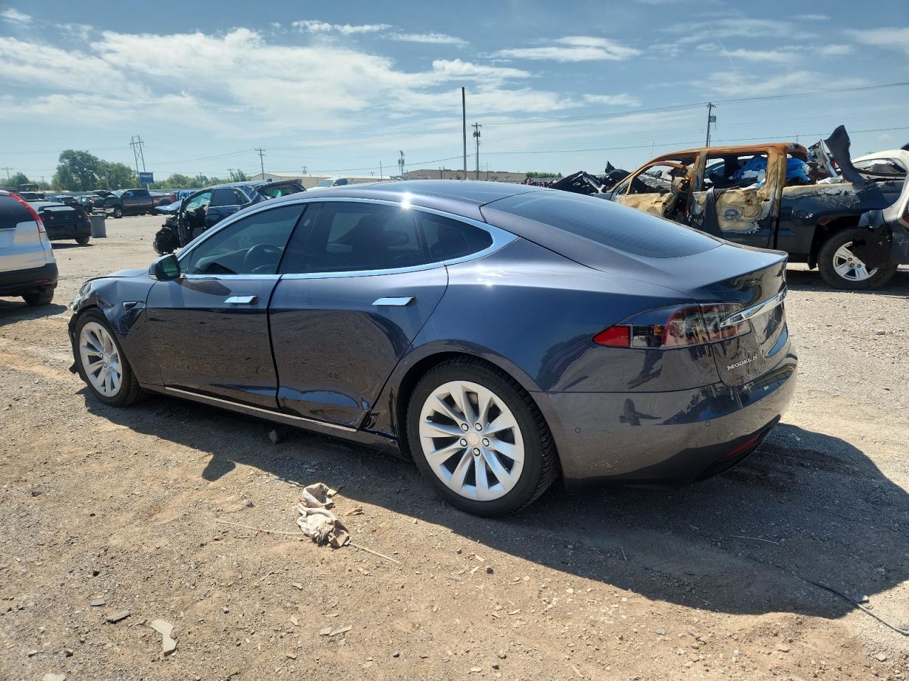 2017 Tesla Model S VIN: 5YJSA1E20HF199831 Lot: 64727045