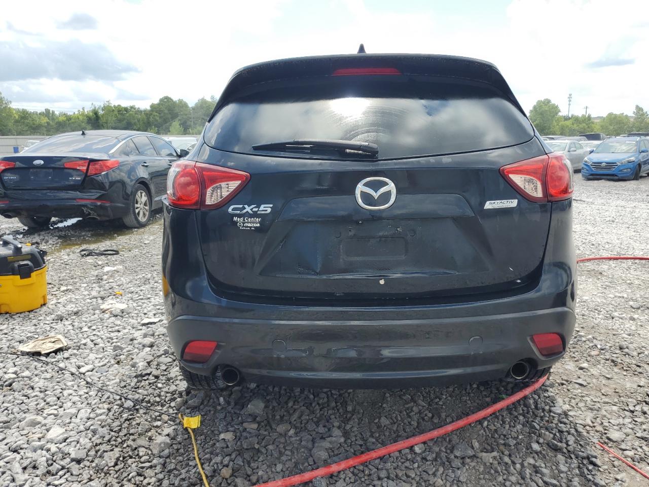 2014 Mazda Cx-5 Touring VIN: JM3KE2CY4E0300050 Lot: 62927445