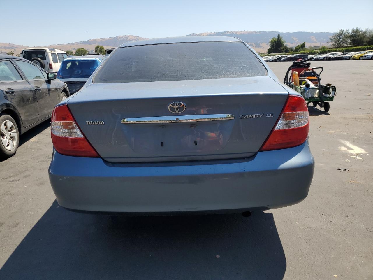 2003 Toyota Camry Le VIN: JTDBE32K230235398 Lot: 59405645
