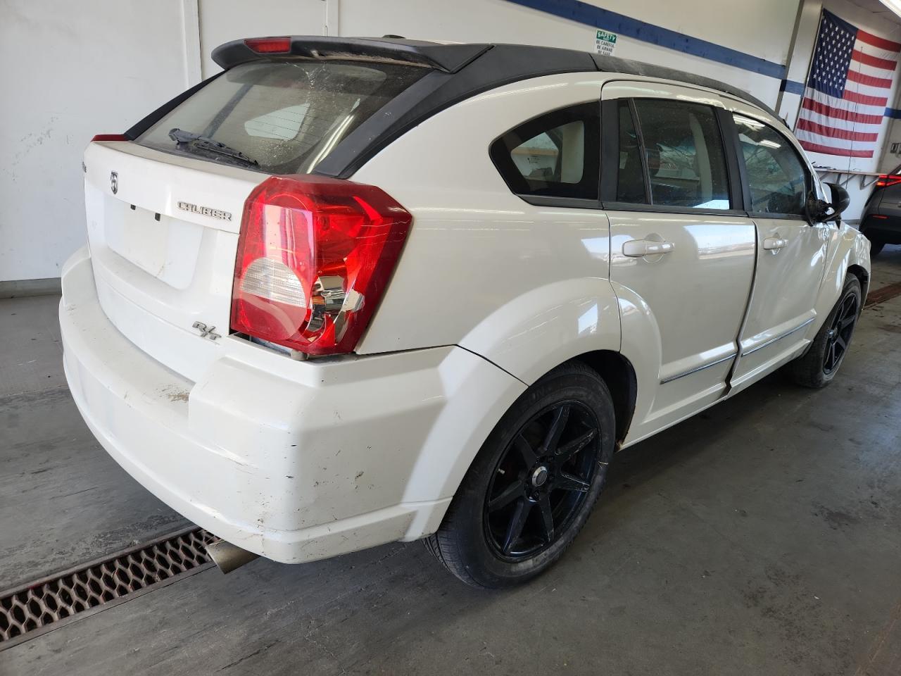 2009 Dodge Caliber R/T VIN: 1B3HB78B39D111841 Lot: 64087845