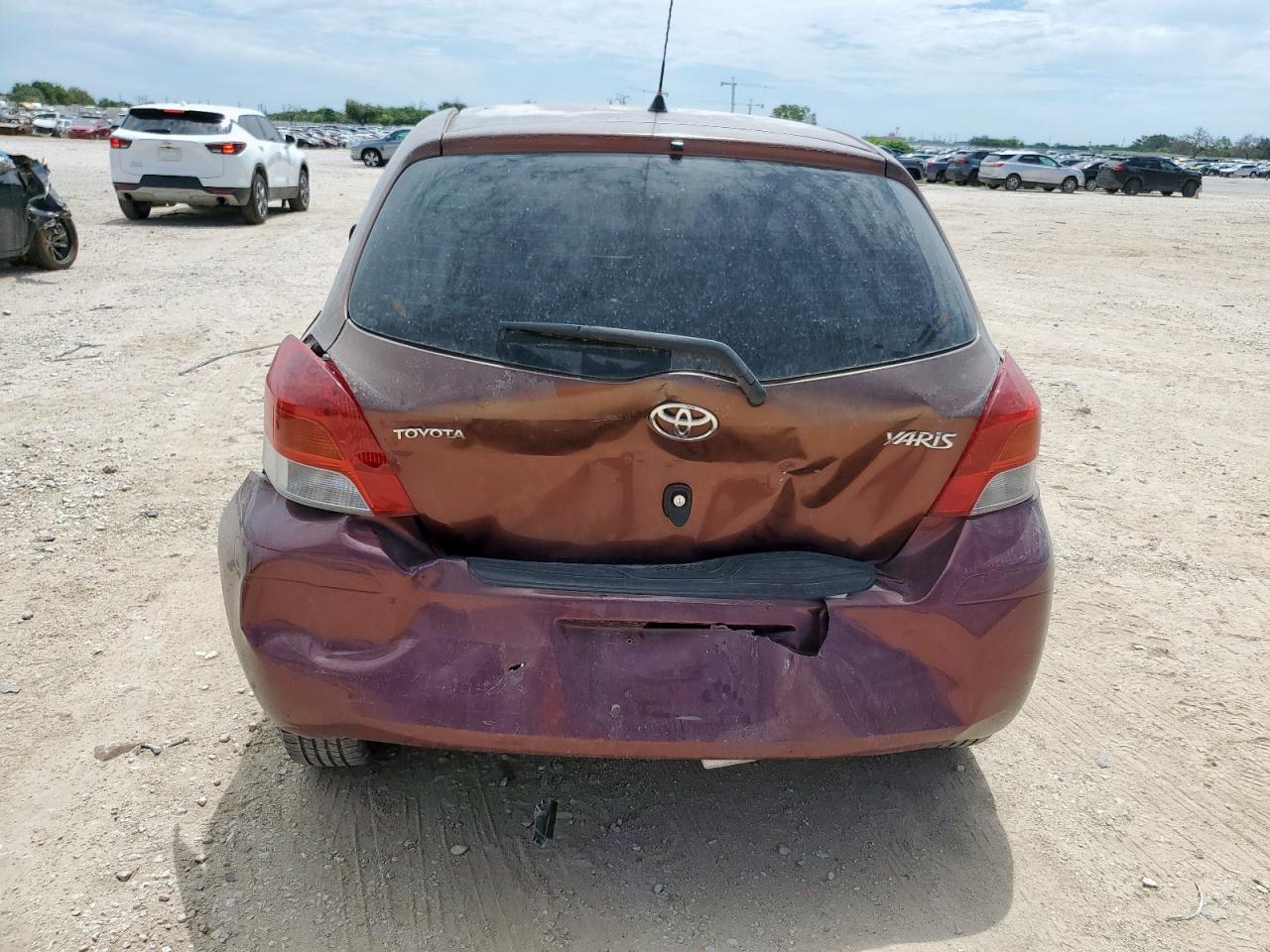 2009 Toyota Yaris VIN: JTDKT903095254936 Lot: 64861005
