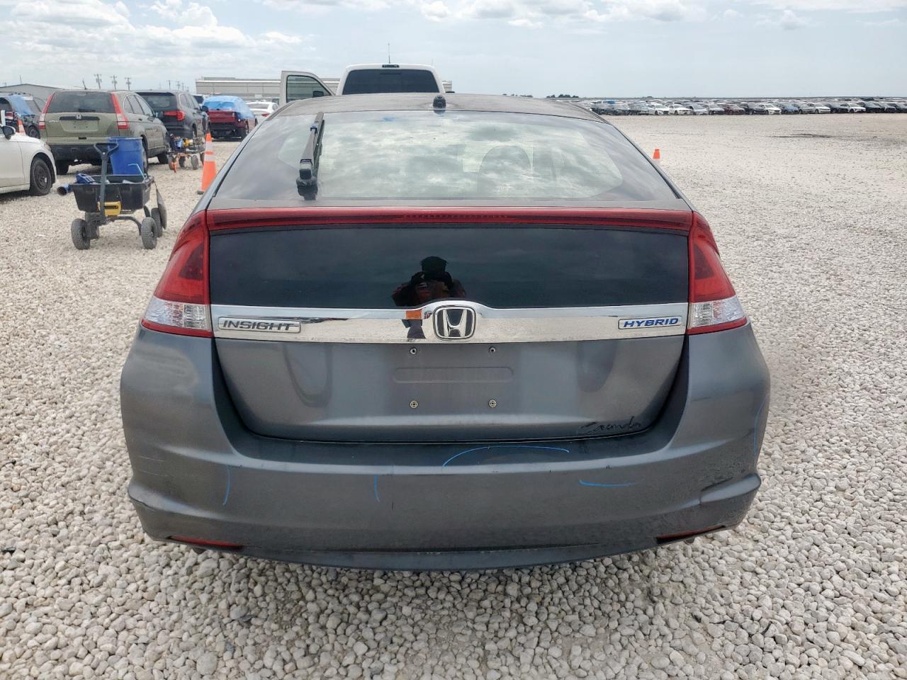 2014 Honda Insight Lx VIN: JHMZE2H55ES000770 Lot: 64090105