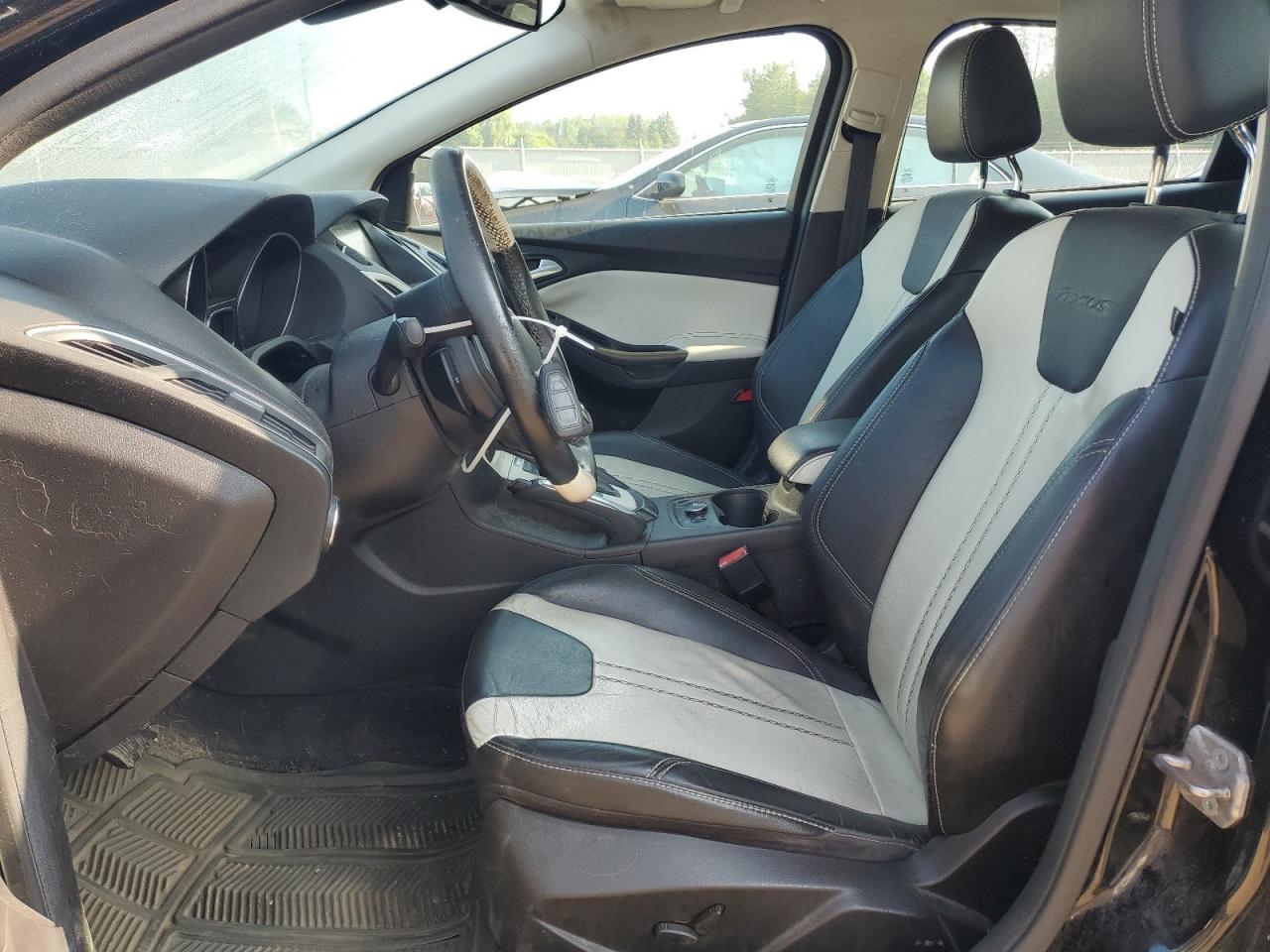 2012 Ford Focus Titanium VIN: 1FAHP3N23CL350015 Lot: 64931695