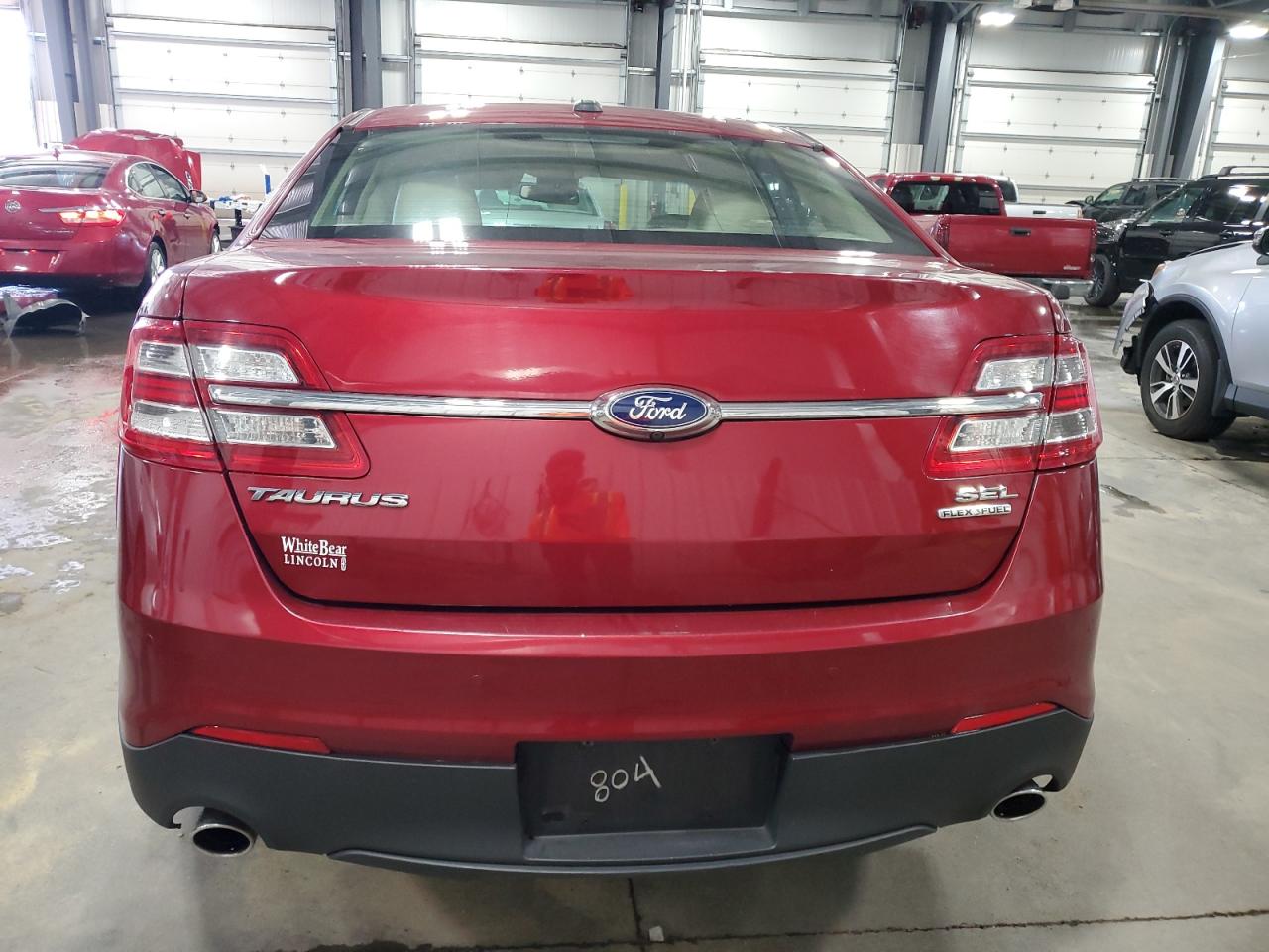 2016 Ford Taurus Sel VIN: 1FAHP2E8XGG104804 Lot: 65261645