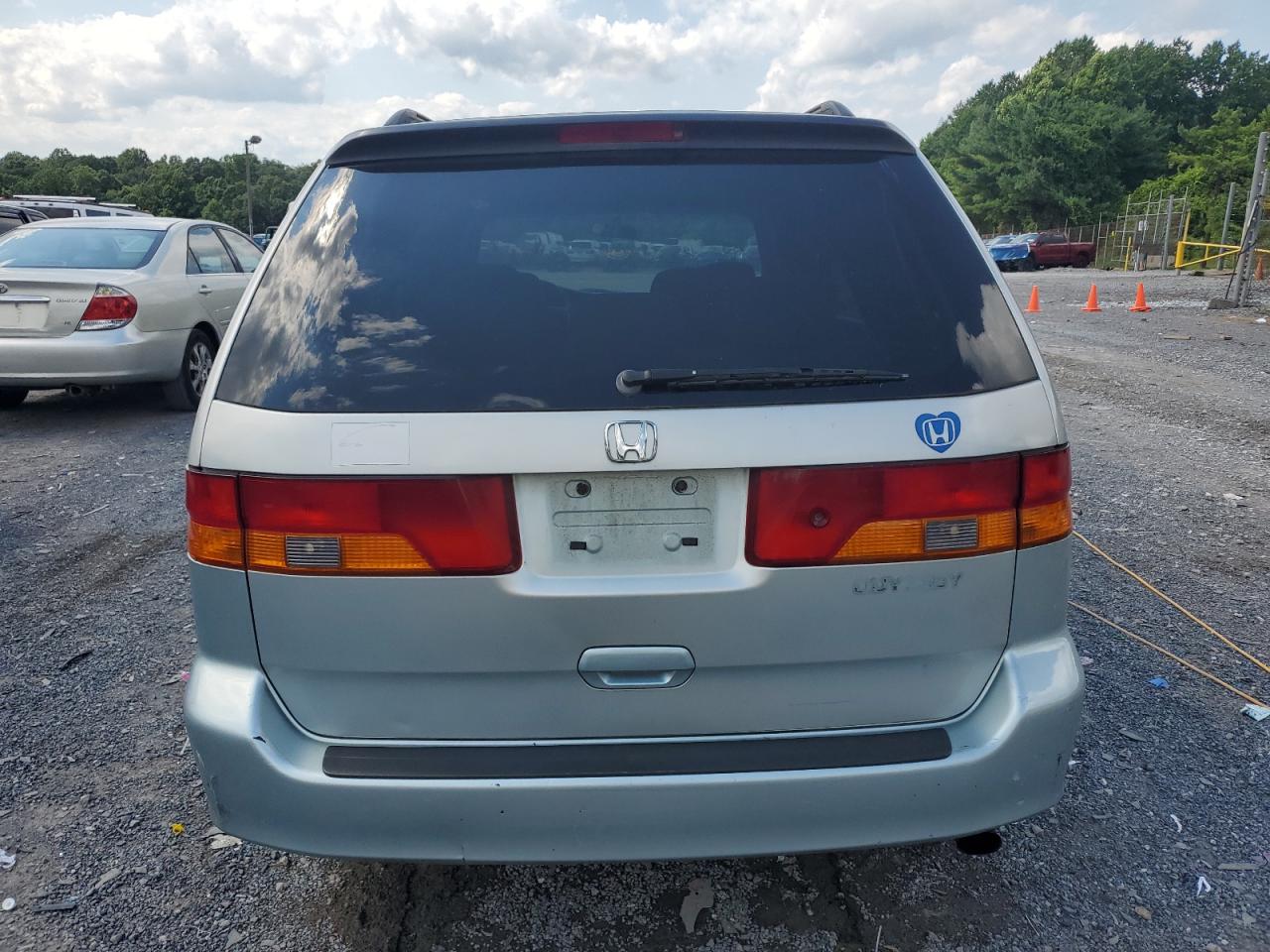 2002 Honda Odyssey Ex VIN: 2HKRL18622H580502 Lot: 65320435