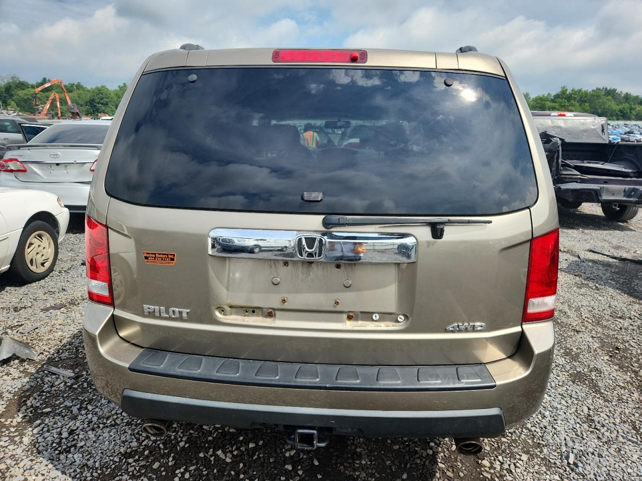 2011 Honda Pilot Exl VIN: 5FNYF4H64BB030950 Lot: 62829785