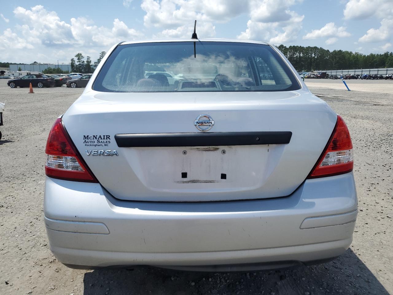2009 Nissan Versa S VIN: 3N1CC11E29L427445 Lot: 64087395