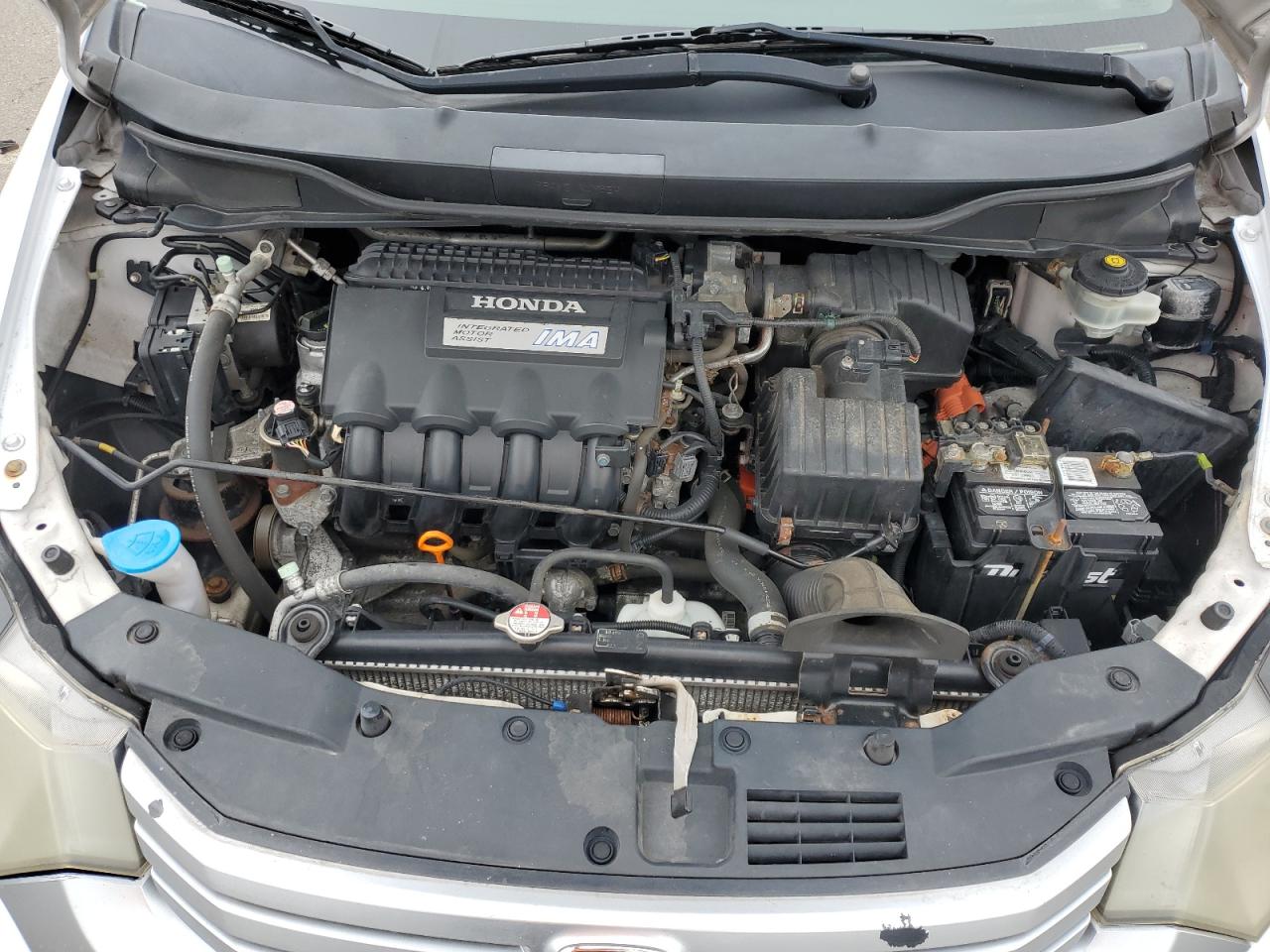 2010 Honda Insight Ex VIN: JHMZE2H72AS011043 Lot: 64619285