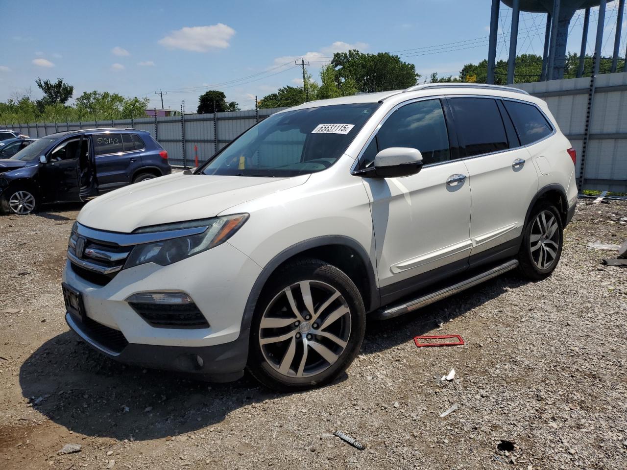 2017 Honda Pilot Touring VIN: 5FNYF6H92HB029990 Lot: 65631115