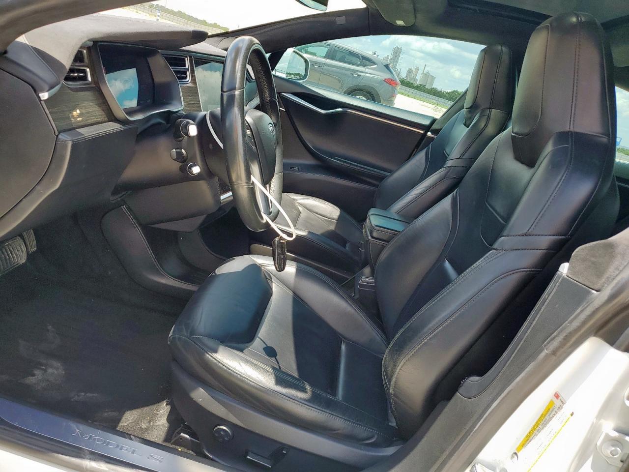 2015 Tesla Model S VIN: 5YJSA1E18FF114433 Lot: 64693325