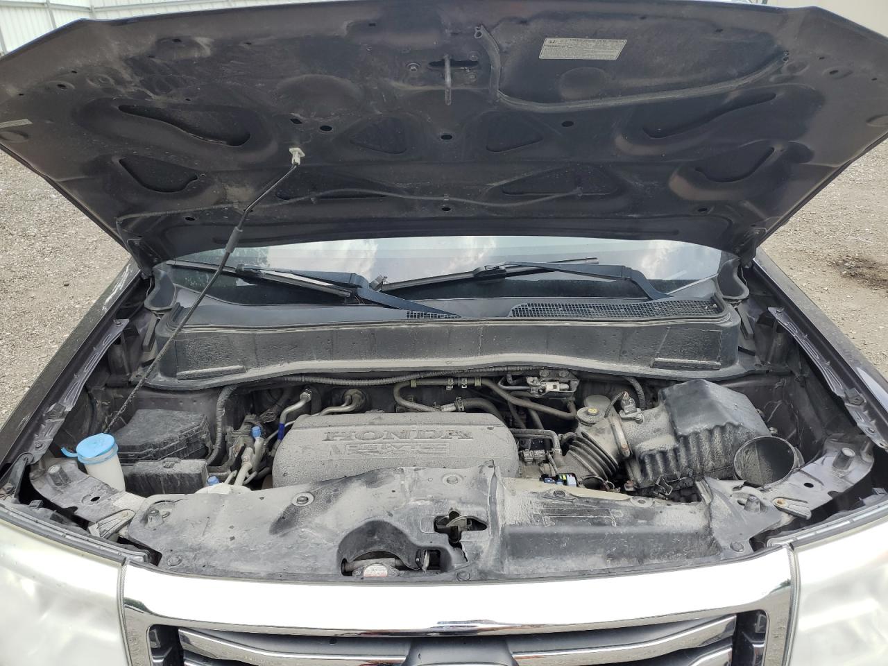 2012 Honda Pilot Exl VIN: 5FNYF4H51CB024970 Lot: 64058625