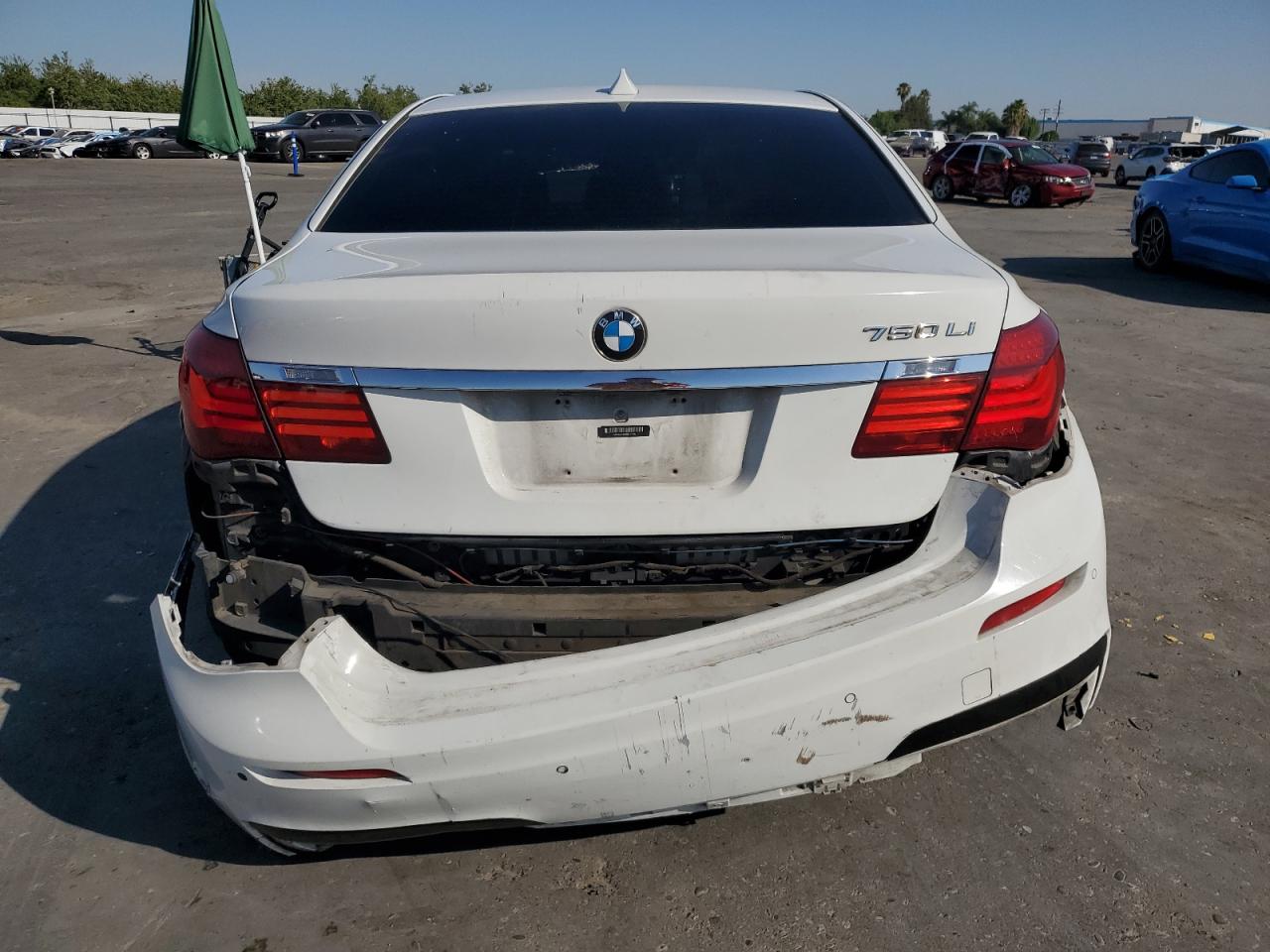 2014 BMW 740 I VIN: WBAYA6C54ED144402 Lot: 63025295