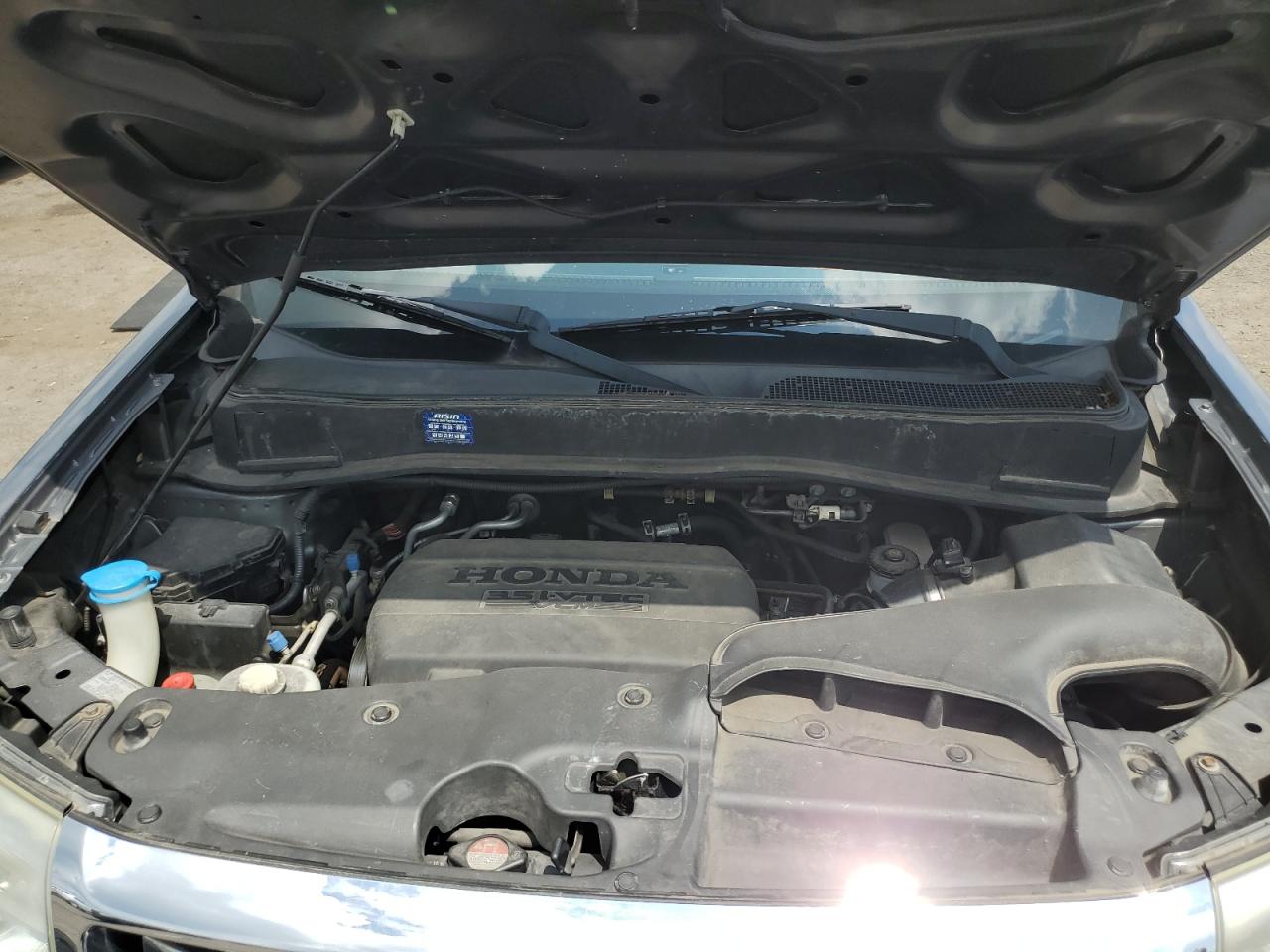 2012 Honda Pilot Exl VIN: 5FNYF4H54CB019973 Lot: 64614135