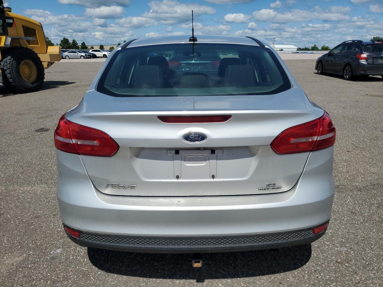 2015 Ford Focus Se VIN: 1FADP3F27FL329685 Lot: 64780805