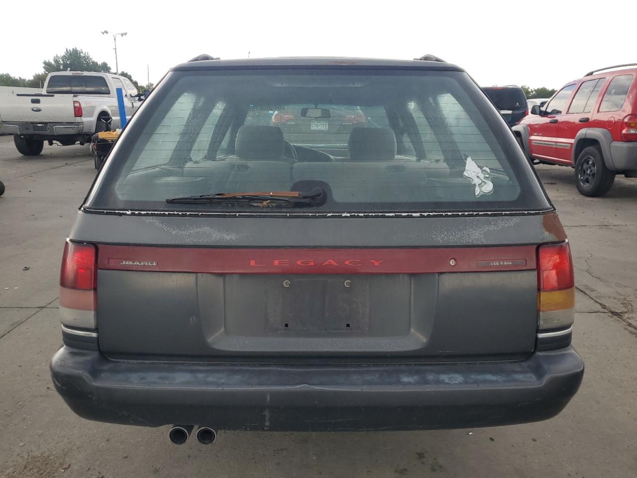 1998 Subaru Legacy L VIN: 4S3BJ6336P7962724 Lot: 64586675