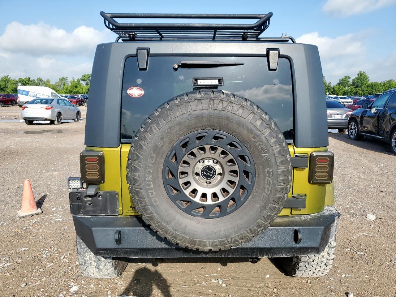 2007 Jeep Wrangler Sahara VIN: 1J4GA59157L152251 Lot: 64802375