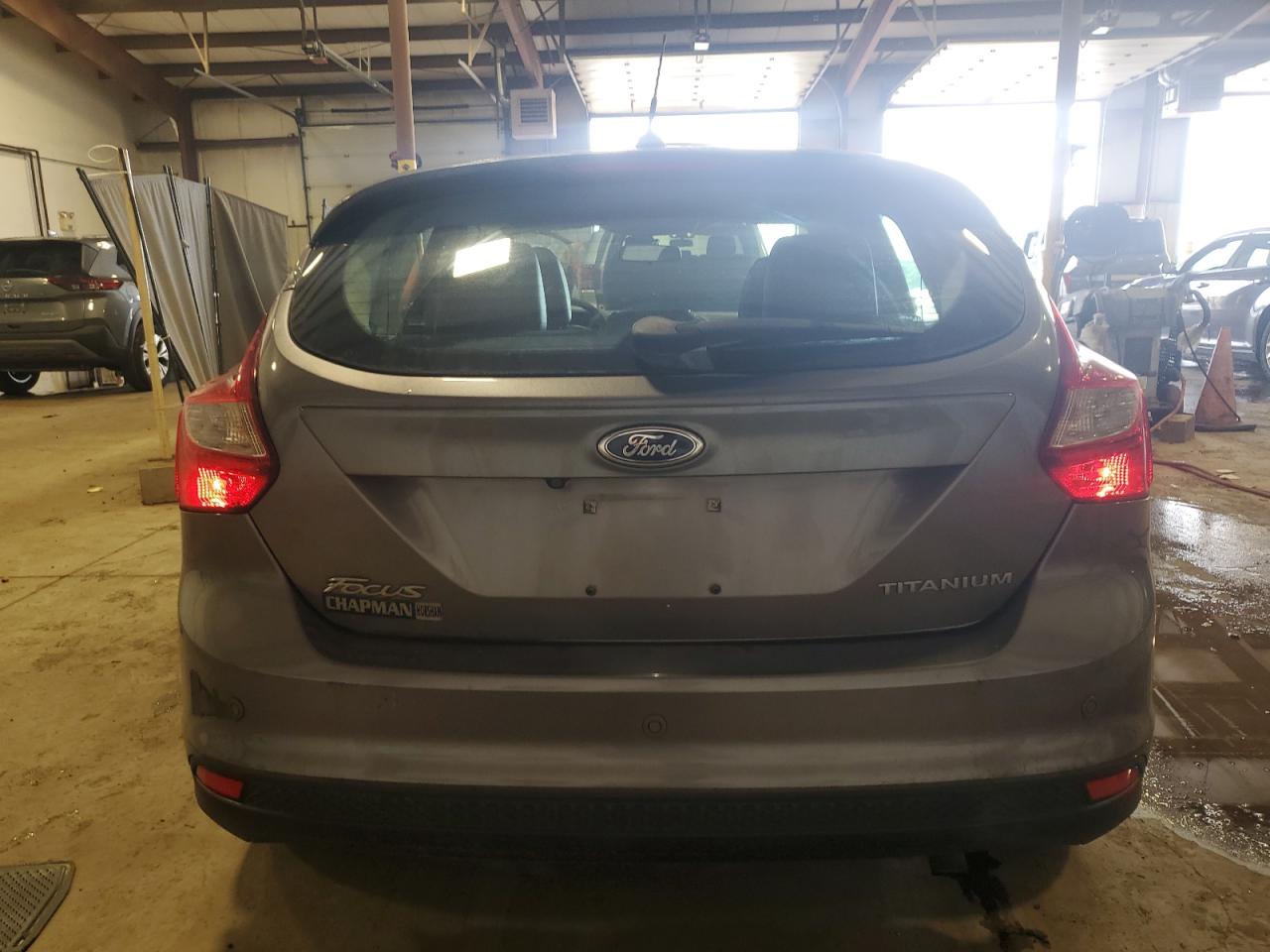2014 Ford Focus Titanium VIN: 1FADP3N27EL462950 Lot: 65207155