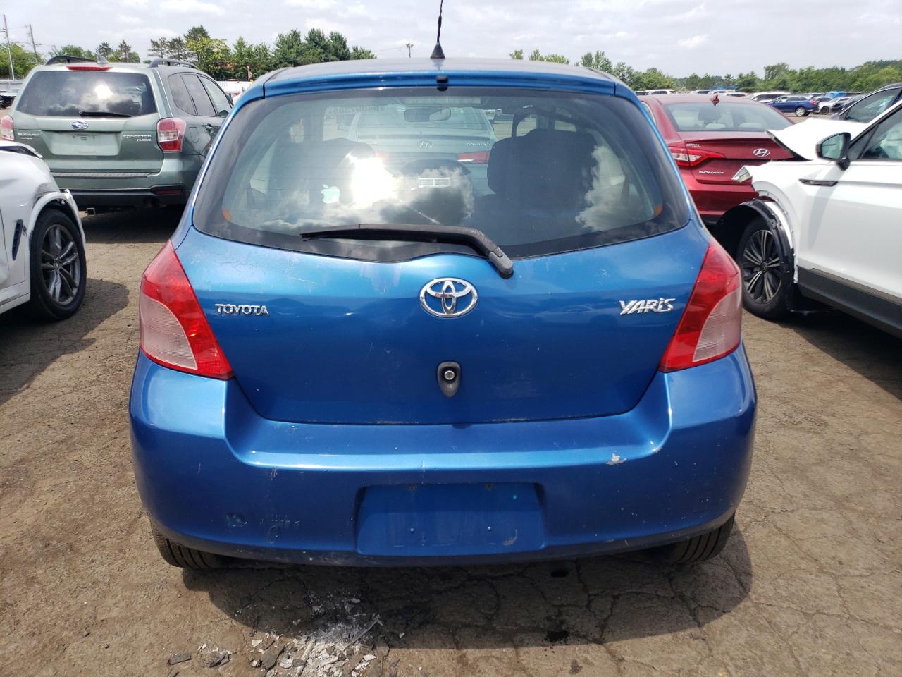 2007 Toyota Yaris VIN: JTDJT923875100013 Lot: 64097385
