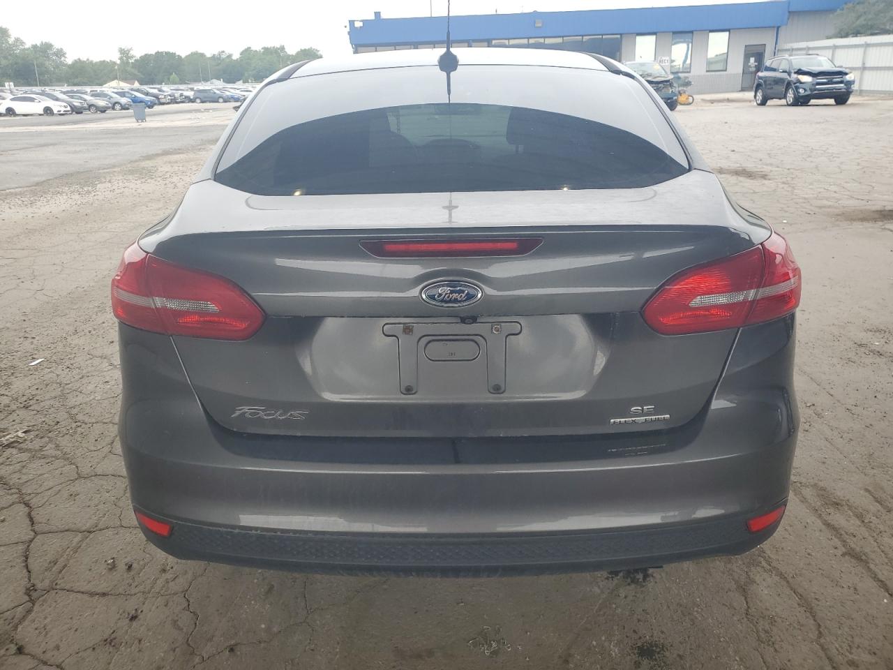 2015 Ford Focus Se VIN: 1FADP3F24FL340160 Lot: 64440105