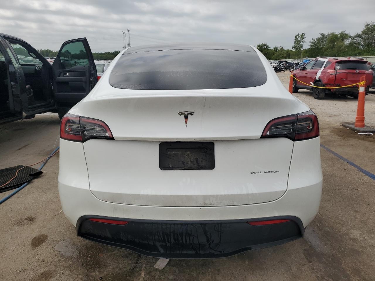 2023 Tesla Model Y VIN: 7SAYGDEEXPF613445 Lot: 65186455