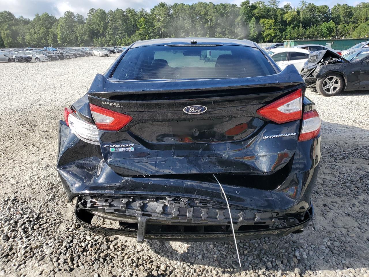 2016 Ford Fusion Titanium Phev VIN: 3FA6P0SU0GR229283 Lot: 65552615