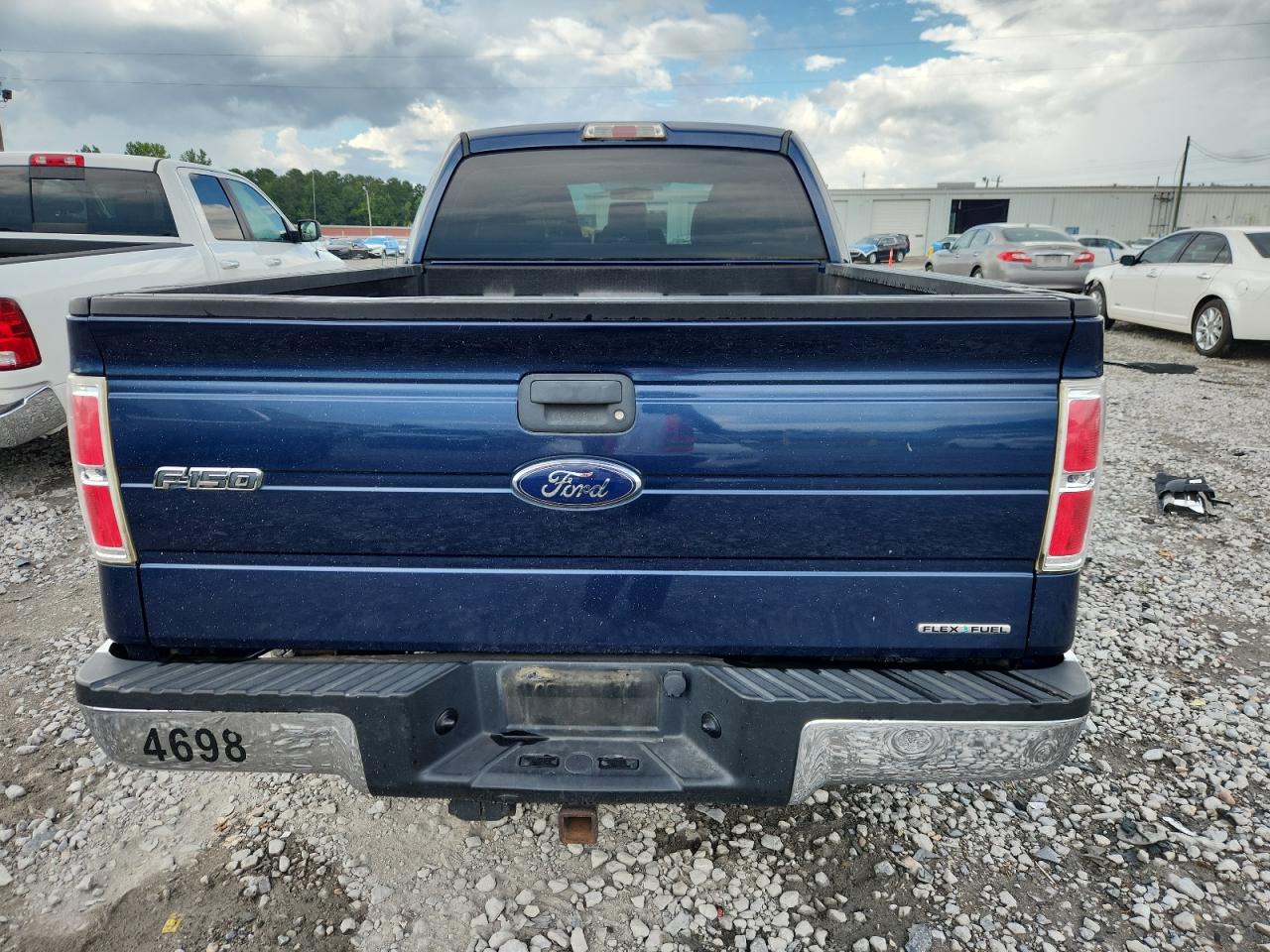 2013 Ford F150 Super Cab VIN: 1FTEX1CM2DFC21236 Lot: 63998555