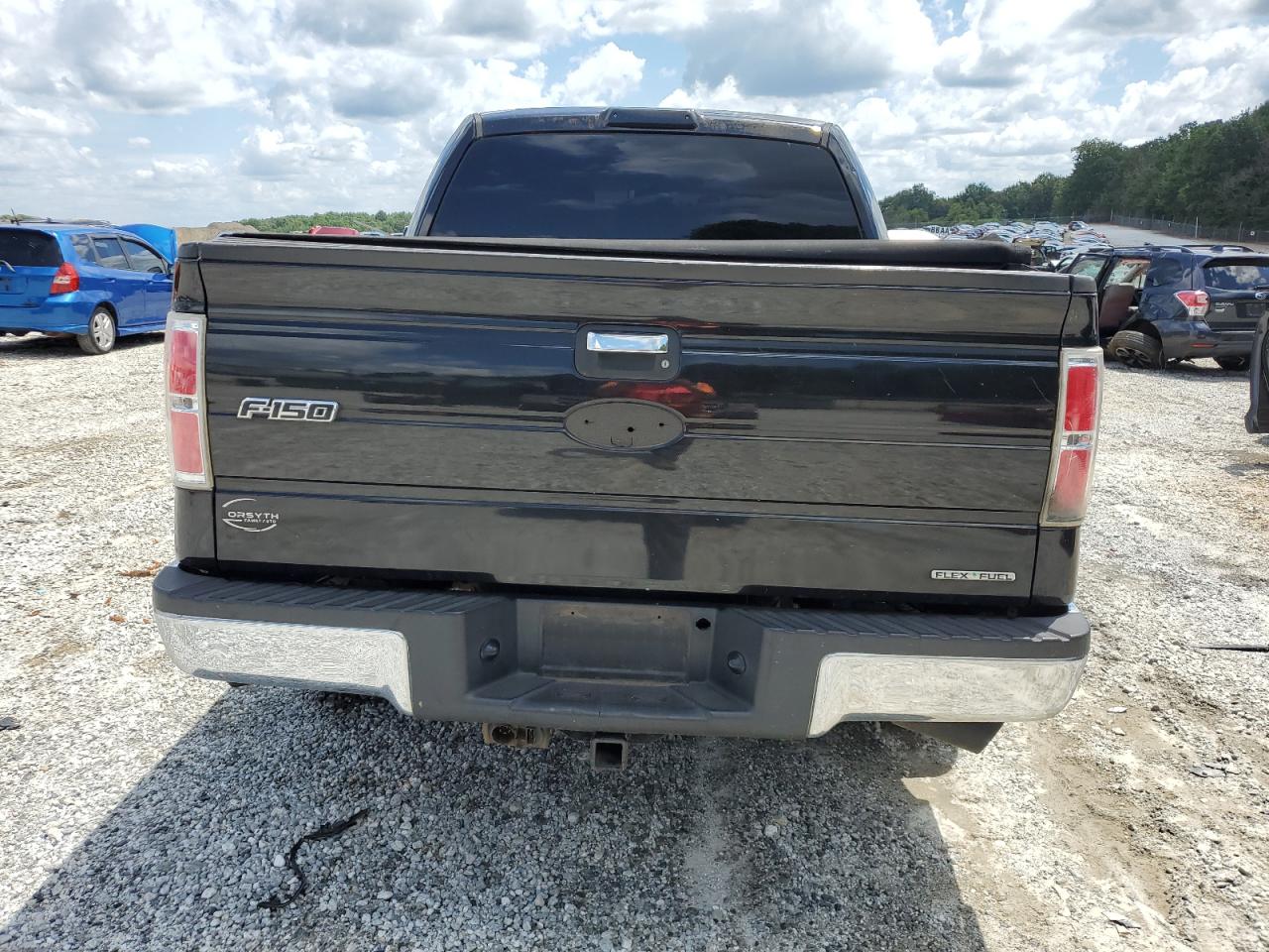 2011 Ford F150 Supercrew VIN: 1FTFW1CF0BFA59399 Lot: 64931385