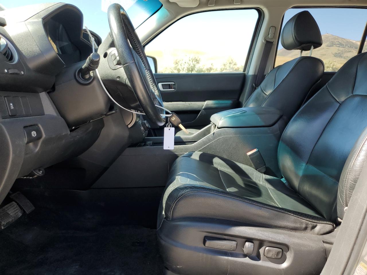 2012 Honda Pilot Exln VIN: 5FNYF4H72CB027507 Lot: 64825885