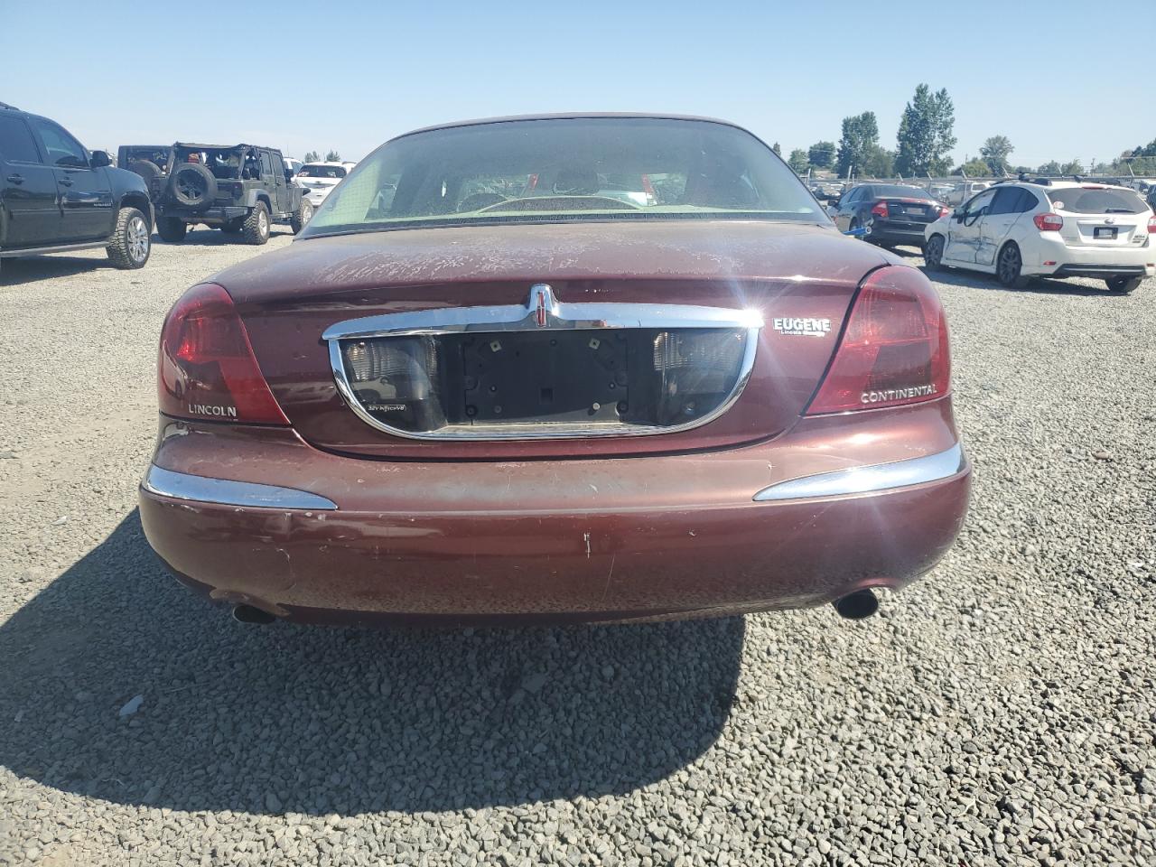 2000 Lincoln Continental VIN: 1LNHM97V0YY885600 Lot: 64902215