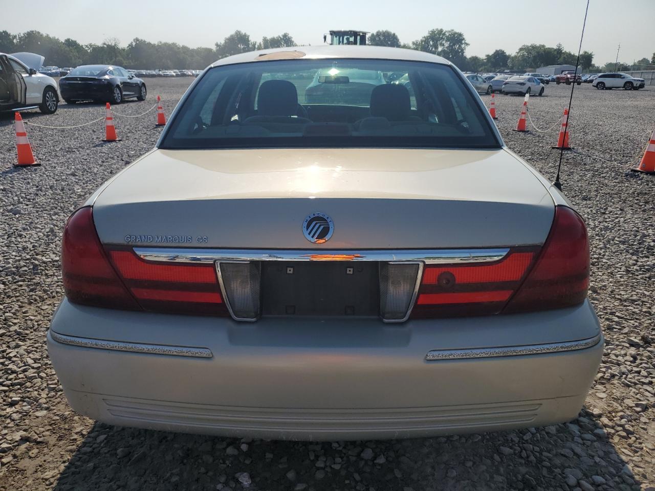 2005 Mercury Grand Marquis Gs VIN: 2MEFM74W65X672853 Lot: 63393935