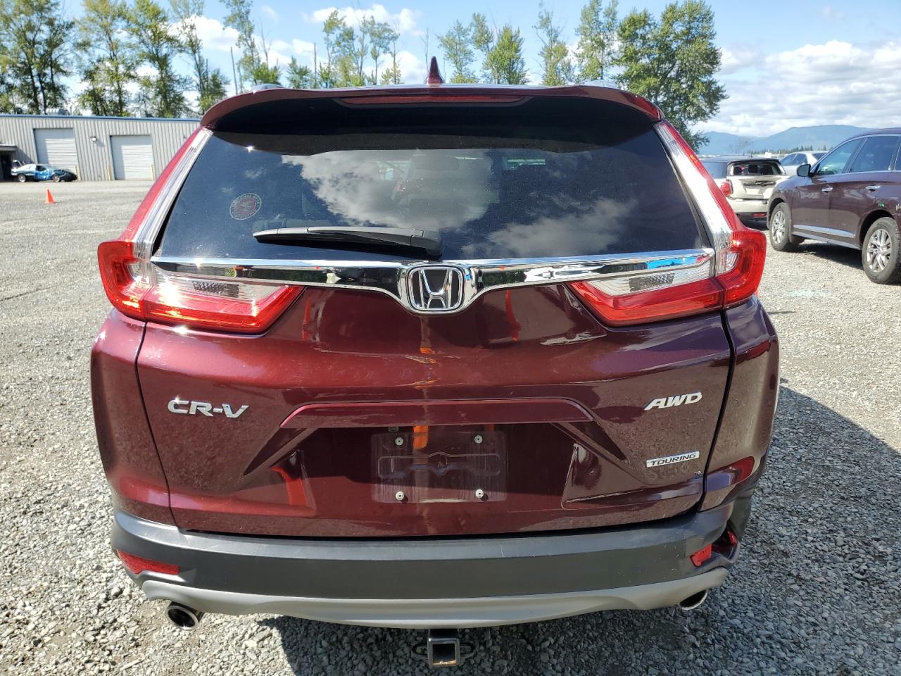 2019 Honda Cr-V Touring VIN: 7FARW2H99KE050702 Lot: 64585945